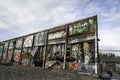 Old industrial building covered with graffiti. Royalty Free Stock Photo
