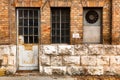 Old industrial building exterior wall, door and window