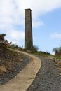 The old industrial chimney from the 19th century South Engine House at the derelict lead mines workings in Conlig in County Down, Royalty Free Stock Photo