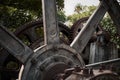 old industrial hydroelectric gear, big cogwheel mechanism, rusty abandoned machine Royalty Free Stock Photo