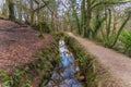 An old industrial leat running through Luxulyan Valley, Cornwall Royalty Free Stock Photo
