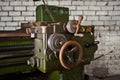 Old industrial machine tool. Rusty metal equipment in abandoned factory