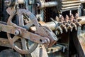 Old industrial mechanism closeup. rusty cogwheels and gears.