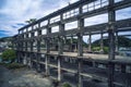 Old industrial ruins building - Agenna Shipyard Ruins with afternoon cloudy sky , shot in Zhongzheng District, Keelung, Taiwan.