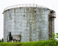 Old industrial storage tank with stairs Royalty Free Stock Photo