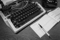 Old ink pen, typewriter, checkbook, old telephone, . (Lettering in french - received from mr. for) Black and white Royalty Free Stock Photo