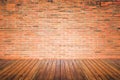 Old interior room with brick wall and wood floor Royalty Free Stock Photo