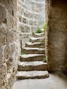 Old internal curved stone staircase in ancient building. Famagusta, Cyprus. Royalty Free Stock Photo