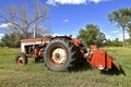 Old 506 International tractor and hay conditioner