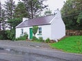 Old Irish Thatch Cottage in a village in Ireland Royalty Free Stock Photo