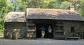 Old Irish Traditional Stone Cottage with thatched roof on a Farm in Ireland Royalty Free Stock Photo