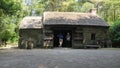 Old Irish Traditional Stone Cottage with thatched roof on a Farm in Ireland Royalty Free Stock Photo