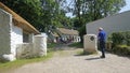 Old Irish Traditional Whitewashed Cottage with a thatched roof at The Ulster America Folk Park Northern Ireland