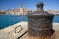 Old iron bollard in Greek harbor Royalty Free Stock Photo