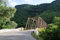 Old iron bridge with a forest behind in Nova Roma do Sul Royalty Free Stock Photo