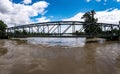 Old iron bridge over the Aare river during the flooding season in Bern, Switzerland Royalty Free Stock Photo