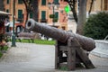 Old iron cannon as a sculpture in park of Santa Magherita Liguge town, Italy