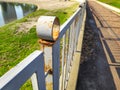 Old iron corrosion rust fence on a natural background in park, garden ourdoor. Close-up Royalty Free Stock Photo