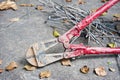 Old iron cutting pliers, tongs or nippers and iron metal wire. I