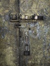 Old iron door with a lock and hasp