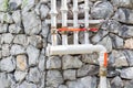 Old iron faucet on grunge stone wall