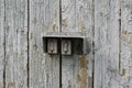 Old iron fence. Old cracked paint. Vintage fence. Rusty metal. Rust structure. Old vintage door handle. Royalty Free Stock Photo