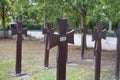 old iron grave crosses in cemetery, funeral 2023, beginning something important, end bad period life, Background for design, copy Royalty Free Stock Photo