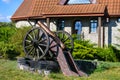 Old iron gun. A cannon that shoots cores. Burning wick. Current model of an old artillery gun. naked gun, cannon on wheels, Royalty Free Stock Photo