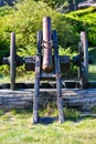 Old iron gun. A cannon that shoots cores. Burning wick. Current model of an old artillery gun. naked gun, cannon on wheels, Royalty Free Stock Photo