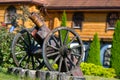 Old iron gun. A cannon that shoots cores. Burning wick. Current model of an old artillery gun. naked gun, cannon on wheels, Royalty Free Stock Photo