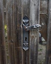 Old iron handle in wood door Royalty Free Stock Photo