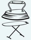 Old iron and ironing board Royalty Free Stock Photo
