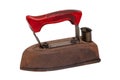 Old iron isolated. Close-up of a professional old rusty electric tailor iron or flatiron with a red handle isolated on a white Royalty Free Stock Photo