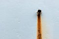 Old iron pipe on cement wall with rusty Royalty Free Stock Photo