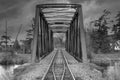 An Old iron railway truss bridge crossing the Mississippi river in spring in Galetta, Ontario, Canada