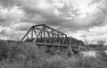 An Old iron railway truss bridge crossing the Mississippi river in spring in Galetta, Ontario, Canada