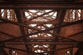 Old iron rusted reinforcement armature structure of a railway bridge with rivets Royalty Free Stock Photo