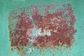 Old iron sheet with peeling brown paint and rusty spots. Royalty Free Stock Photo