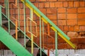 old iron staircase of a red brick wall Royalty Free Stock Photo