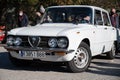 Old Italian Alfa Romeo Giulia Nuova Super 1.6 of the second generation in the color white Royalty Free Stock Photo