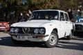 Old Italian Alfa Romeo Giulia Nuova Super 1.6 of the second generation in the color white Royalty Free Stock Photo