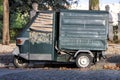 Old Italian car parked in a historic park (Rome, Italy)