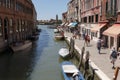 An old italian city with water channels and boats