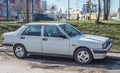 Old classic white Lancia LX sedan right side and front view