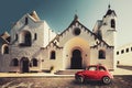 Old vintage italian scene. Small antique red car. Fiat 500 Royalty Free Stock Photo