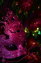 Mascarade purple glitter mask invites speculation Royalty Free Stock Photo