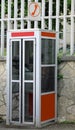 old italian phone booth called CABINA TELEFONICA Royalty Free Stock Photo