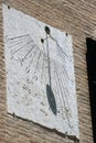 Old italian sundial in stone support Royalty Free Stock Photo