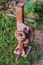 House lifting jack. Old rusty mechanical screw jack