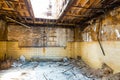 Old jail interior with brick walls.